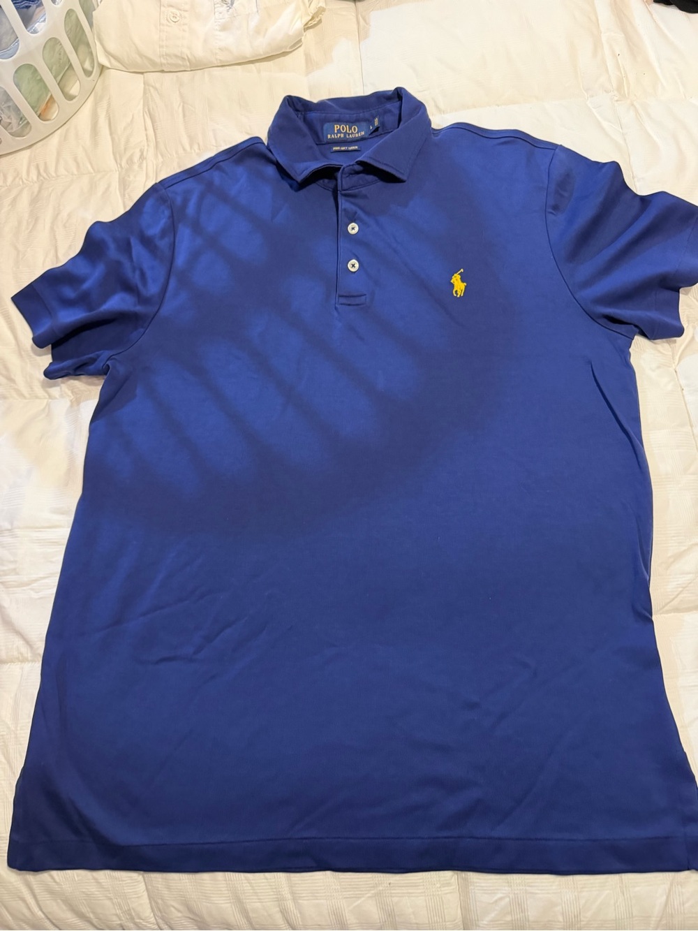Ralph Lauren Polo Short Sleeve in Deep Blue with Yellow Logo.